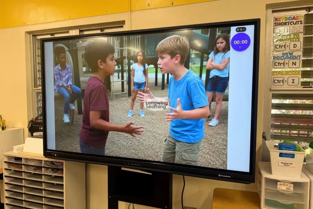 teacher using a picture prompt to introduce primary and secondary sources in Wonders 5th grade